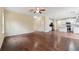 Open living room with hardwood floors, fireplace, and open floor plan at 3892 Trillium Wood Trl, Snellville, GA 30039
