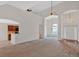 Expansive living room features vaulted ceilings and abundant natural light, showcasing an open layout at 57 Craig Meadows Ln, Douglasville, GA 30134