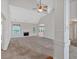 Spacious living room featuring a fireplace, large windows for natural light, and vaulted ceilings at 57 Craig Meadows Ln, Douglasville, GA 30134