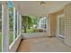 Comfortable screened-in porch with ample space and views of the yard at 57 Craig Meadows Ln, Douglasville, GA 30134