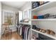 Well-organized walk-in closet with ample shelving and hanging space at 111 Brighton Blvd, Woodstock, GA 30188