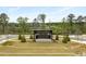 Community stage on manicured lawn for outdoor performances and gatherings at 111 Brighton Blvd, Woodstock, GA 30188