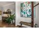 Inviting foyer with hardwood floors, stylish decor, and a glimpse into the home's elegant design at 111 Brighton Blvd, Woodstock, GA 30188