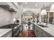 Modern kitchen with stainless steel appliances and marble countertops at 111 Brighton Blvd, Woodstock, GA 30188