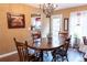 Comfortable dining area with hardwood floors, natural lighting, and rustic furniture at 169 Concorde Dr, Villa Rica, GA 30180