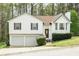 Charming two-story home with a two-car garage and well-maintained landscaping at 169 Concorde Dr, Villa Rica, GA 30180