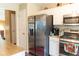 Well-equipped kitchen featuring stainless steel appliances and a breakfast bar area at 169 Concorde Dr, Villa Rica, GA 30180