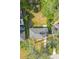 Aerial view of a house with a large backyard and mature trees at 2146 Trailwood Rd, Decatur, GA 30032