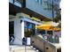 Stylish building with glass windows, shaded outdoor seating, and modern architectural details at 2146 Trailwood Rd, Decatur, GA 30032