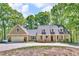 Charming home with a welcoming front porch and attached two-car garage at 4336 Yancey Rd, Douglasville, GA 30135
