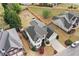 Aerial view of property featuring a backyard with pergola, landscaped lawn, and two-car garage at 5241 Marston Rd, Atlanta, GA 30360