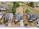 Birds eye view of property featuring a spacious backyard, landscaped lawn, and two-car garage at 5241 Marston Rd, Atlanta, GA 30360