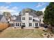 A well-maintained backyard features a patio, grill, water feature and outdoor seating, perfect for entertaining at 5241 Marston Rd, Atlanta, GA 30360