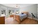 Comfortable bedroom with hardwood floors, large windows, and plenty of natural light at 5241 Marston Rd, Atlanta, GA 30360