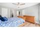 Cozy bedroom with hardwood floors, ceiling fan, and views to hallway and bath at 5241 Marston Rd, Atlanta, GA 30360