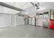 Spacious three-car garage with epoxy flooring and tons of storage and work space at 5241 Marston Rd, Atlanta, GA 30360