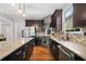 Gourmet kitchen featuring stainless steel appliances, granite counters, and hardwood floors at 5241 Marston Rd, Atlanta, GA 30360