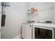 Well-organized laundry room with modern washer and dryer units, and ample storage at 5241 Marston Rd, Atlanta, GA 30360