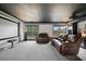 Home theater with a starry ceiling, projector, screen, and comfortable leather recliners at 5241 Marston Rd, Atlanta, GA 30360