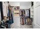 Spacious walk-in closet with ample shelving and hanging space offers generous storage at 5241 Marston Rd, Atlanta, GA 30360