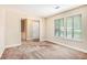 Bedroom featuring carpet, trim and natural light at 5286 Westhill Dr, Norcross, GA 30071