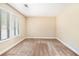 Neutral bedroom with large windows, carpet and natural light at 5286 Westhill Dr, Norcross, GA 30071