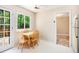 The kitchen nook has a table with windows looking out to the greenery at 5286 Westhill Dr, Norcross, GA 30071