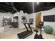 Finished basement with home gym and office spaces at 3765 Michaels Way, Cumming, GA 30040