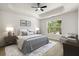 Serene main bedroom with trey ceilings, natural light, and neutral tones at 3765 Michaels Way, Cumming, GA 30040