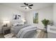 This bedroom has a ceiling fan, bedside tables with lamps, and a window with natural light at 3765 Michaels Way, Cumming, GA 30040