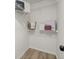 Bright walk-in closet with white wire shelving, providing ample storage space at 3765 Michaels Way, Cumming, GA 30040