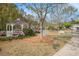 Community gazebo featuring mature landscaping, benches and sidewalks, creating a serene environment at 3907 Fellowship Dr, Buford, GA 30519