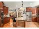 Bright kitchen with granite countertops, stainless appliances, and ample cabinet space for storage at 3907 Fellowship Dr, Buford, GA 30519