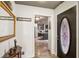 Inviting entryway with hardwood floors and stained-glass front door, flowing into a stylish kitchen at 1899 Cooper Landing Se Dr, Smyrna, GA 30080