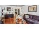 Cozy living room with hardwood floors, comfortable seating, and stylish decor at 1899 Cooper Landing Se Dr, Smyrna, GA 30080