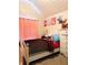 Charming bedroom with vaulted ceiling, a single bed, and matching white dresser at 2896 Spence Ct, Dacula, GA 30019
