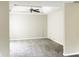 Versatile bonus room features modern ceiling fan and a ceiling, perfect for various activities at 2896 Spence Ct, Dacula, GA 30019
