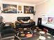 Comfortable living room featuring modern furniture, a large TV, and stylish decor at 2896 Spence Ct, Dacula, GA 30019