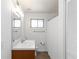 Bright bathroom features a modern vanity, tile floors, and a shower with a white curtain at 3046 Briarcliff Ne Rd # 7, Atlanta, GA 30329