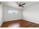 Bright bedroom with hardwood floors, a ceiling fan, and a large window for natural light at 3046 Briarcliff Ne Rd # 7, Atlanta, GA 30329