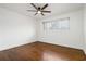 Cozy bedroom with hardwood floors, a window, and a ceiling fan for a comfortable living space at 3046 Briarcliff Ne Rd # 7, Atlanta, GA 30329