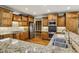 Well-equipped kitchen with granite countertops and stainless steel appliances at 9075 Preston Ln, Suwanee, GA 30024