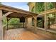Beautiful wooden deck featuring a gazebo with view of the backyard at 9075 Preston Ln, Suwanee, GA 30024