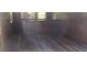 Basement with wood-style floors, bar, and wood paneling at 4141 Fredericksburg Dr, College Park, GA 30337