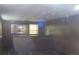 Basement with wood-style floors, bar, and wood paneling at 4141 Fredericksburg Dr, College Park, GA 30337