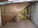 Unfinished basement with block wall, utility sink and wood paneling at 4141 Fredericksburg Dr, College Park, GA 30337