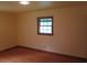 Bedroom with hardwood floors, yellow walls and one window with blinds at 4141 Fredericksburg Dr, College Park, GA 30337