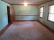 Bedroom with carpet, two windows, and light blue walls at 4141 Fredericksburg Dr, College Park, GA 30337