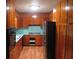 A cozy kitchen featuring wooden cabinets, appliances and laminate countertops at 4141 Fredericksburg Dr, College Park, GA 30337