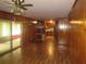 A warm and inviting living room with laminate floors and a sliding door at 4141 Fredericksburg Dr, College Park, GA 30337